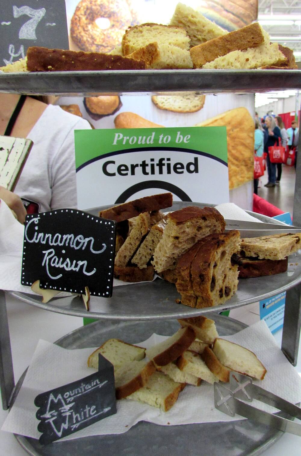 Photo of Canyon Bakehouse Gluten-Free bread display, ft. Cinnamon Raisin, and Mountain White