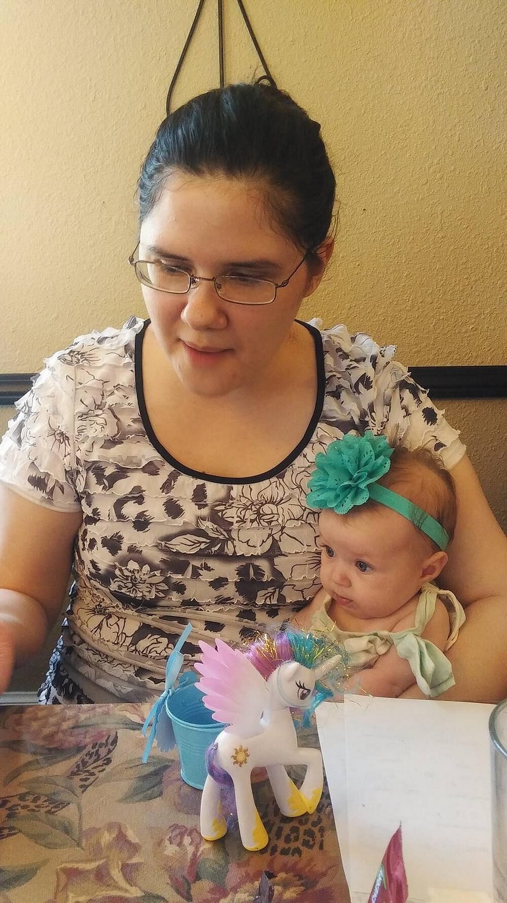 Candid photo of my cousin Solara and I at our cousin's baby shower
