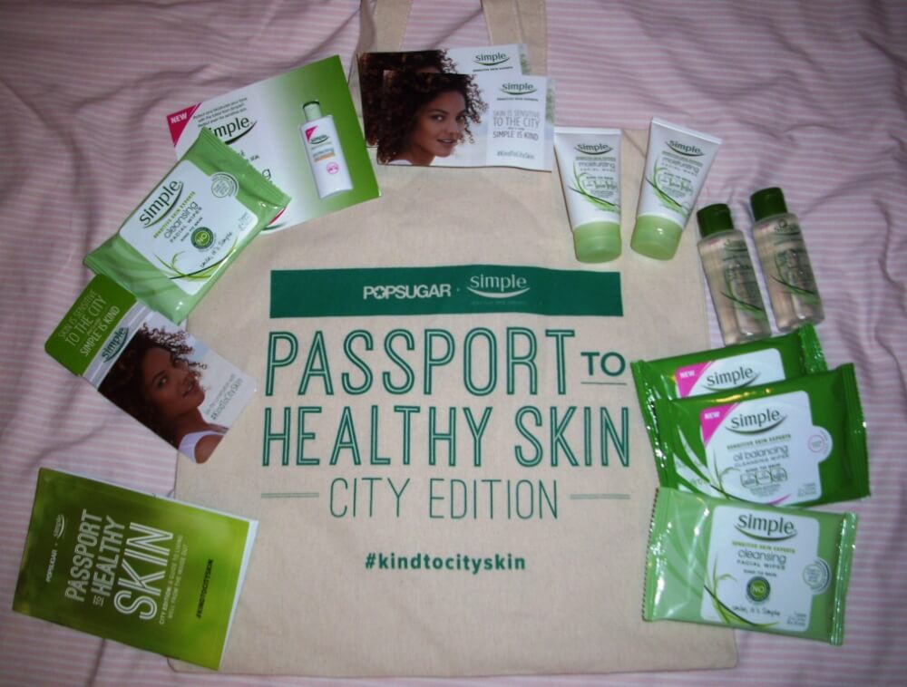 Starting with the Passport to Healthy Skin booklet and going up: info card, Cleansing Facial Wipes (2), Protecting Light Moisturizer SPF 15 (1), 2 coupons for $2 off, Moisturizing Facial Wash (2), Eye Makeup Remover (2), Oil Balancing Cleansing Wipes (2), and a tote bag.